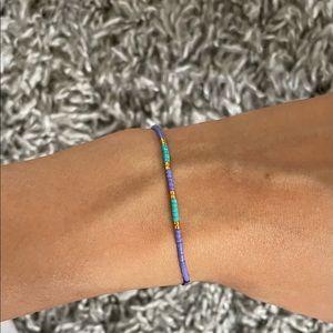 Hand made bracelet with purple beads